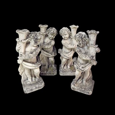 Quattro Sculture in Pietra Composta