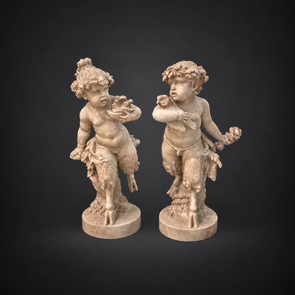Coppia di sculture in marmo bianco