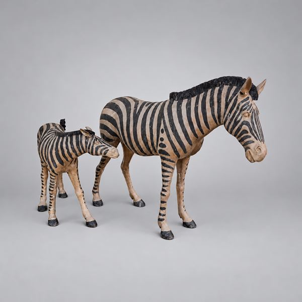 Due zebre in bronzo a patina nera e ramata